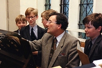 John Sanders working with the Choristers of Gloucester Cathedral